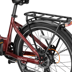 Close-up of the red Heybike Hybrid rear rack, fender, and wheel.