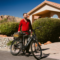 Man standing beside a black Heybike Hybrid electric bike outdoors.