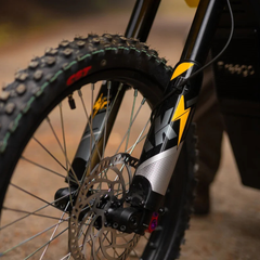 FreeGo Nova 5 Mid-Drive Off-Road Electric Dirt Bike front fork and brake detail