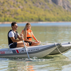 Aqua Marina AIRCAT 3.35m Inflatable Catamaran on water with two people rowing