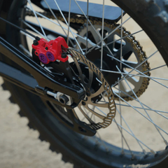 FreeGo Nova 5 Mid-Drive Off-Road Electric Dirt Bike rear hydraulic brake detail
