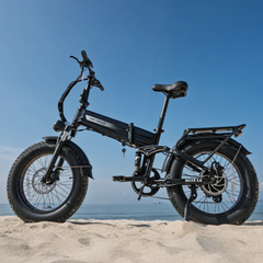 Black Heybike Mars 3.0 electric bike displayed on a sandy beach.