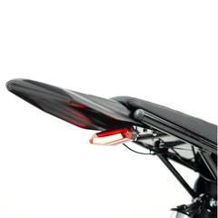 Close-up of the Heybike Villain seat and illuminated rear light.