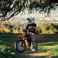 Yozma IN 10 Pro Red Electric Dirt Bike with Rider Outdoors