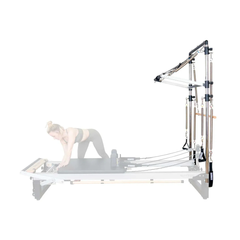 Align-Pilates Half Cadillac Frame (for A, M, C Series) in use with Pilates reformer for kneeling exercise