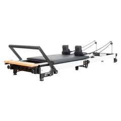 Align-Pilates F3 Folding Home Reformer angled view showing reformer frame, carriage, shoulder rests, footbar, and rope system