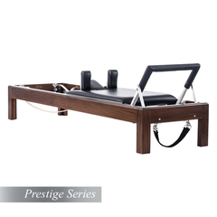 Legacy Pilates Apparatus 80" Walnut Pilates Reformer with black carriage and footbar