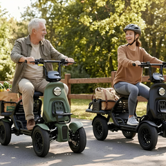 Two riders using green S500 Utility Vehicles outdoors