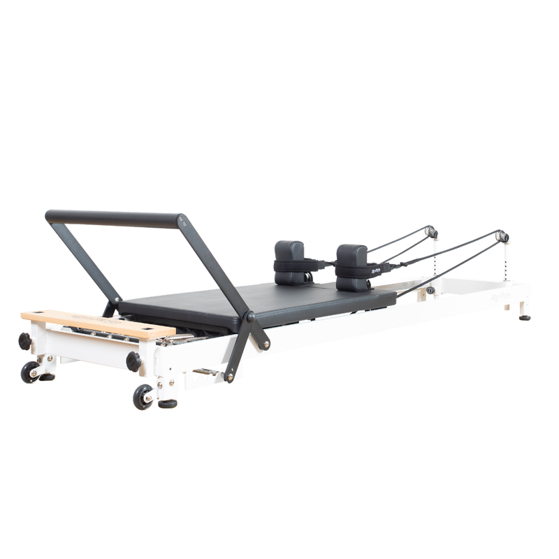Align-Pilates R8-Pro Light Commercial Reformer White angled view showing reformer frame, carriage, shoulder rests, footbar, and rope system
