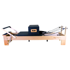 Align-Pilates M8 Pro Maple Reformer + Pro Sitting Box side view showing full reformer frame, carriage, ropes, and sitting box