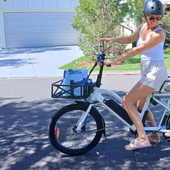 Eunorau black front basket installed on an orange electric bike