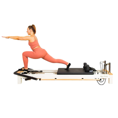 Align-Pilates C8-S Reformer in use for standing lunge Pilates exercise