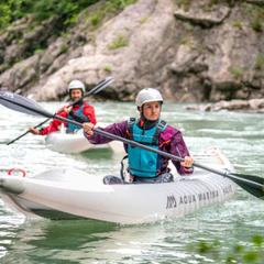 Aqua Marina Halve 13'1" Packayak on water with two paddlers