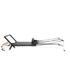 Align-Pilates R8-Pro Light Commercial Reformer White side view showing full reformer length, carriage, footbar, and ropes