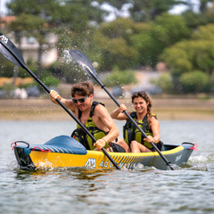 Aqua Marina Tomahawk AIR-K 12'4" Kayak on water with two paddlers
