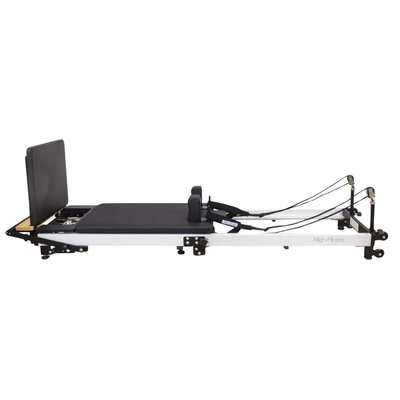 Align-Pilates F3 Folding Home Reformer side view with jump board installed and full reformer frame
