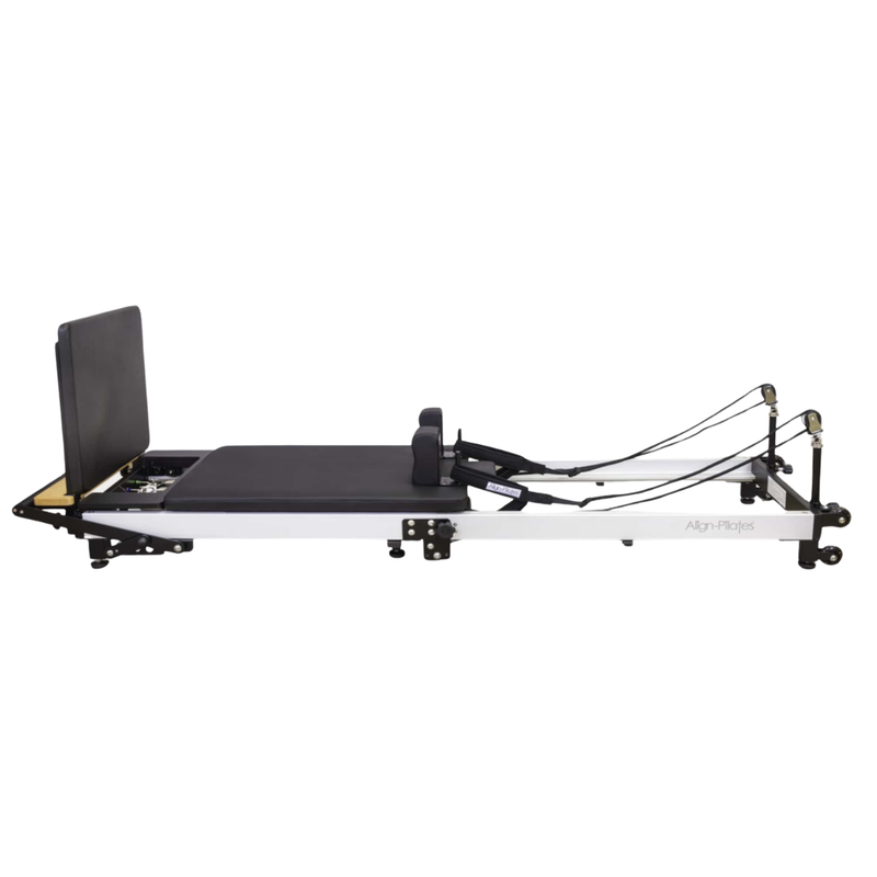 Align-Pilates F3 Folding Home Reformer side view with jump board installed and full reformer frame