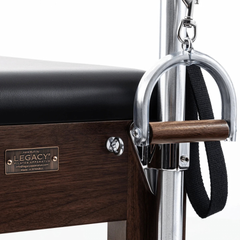Legacy Pilates Apparatus Pilates Cadillac – walnut wood frame and metal attachment detail