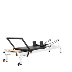 Align-Pilates R8-Pro Light Commercial Reformer White angled side view showing carriage platform, shoulder rests, footbar, and frame
