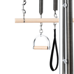 Close-up of spring and handle attachments on Legacy Pilates Apparatus Pilates Wall Unit with Foldable Low Mat