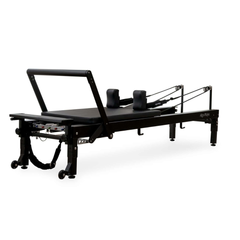 Align-Pilates C8-Pro Noir Reformer Black front angled view showing footbar, carriage, springs, and frame details
