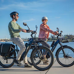 Himiway A7 electric bikes in use by two riders outdoors