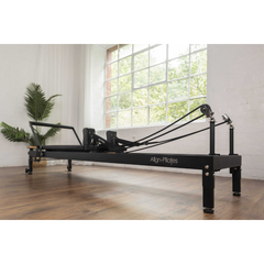Align-Pilates R8-Pro Light Commercial Reformer Black in studio setting showing full reformer setup