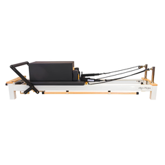 Align-Pilates C8-S Reformer side view showing jump board, carriage, footbar, and rope system
