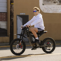 FreeGo X1 Electric Dirt Bike rider street view