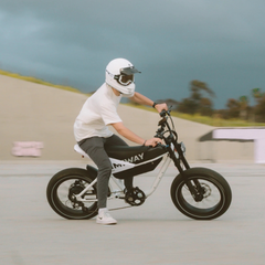 Himiway C5 electric bike in use on paved road with rider
