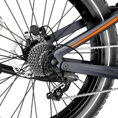 Close-up of the Hero rear cassette, derailleur, chain, and wheel.