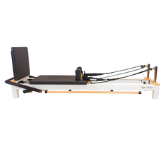 Align-Pilates C8-S Reformer side view showing jump board installed and full reformer frame