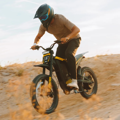 Rider operating the Jasion Patrol 52 electric dirt bike on an off-road trail
