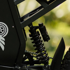 FreeGo X1 Electric Dirt Bike rear suspension detail