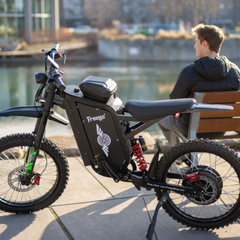 FreeGo X3 Pro All-Terrain Electric Dirt Bike black outdoor side view