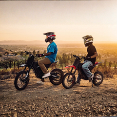 Yozma IN 10 Electric Dirt Bikes with Two Riders Outdoors