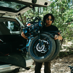 Rider loading the Jasion Hunter Pro electric bike into a vehicle