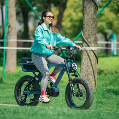 Rider using the blue Eunorau Flash 2.0 in a park