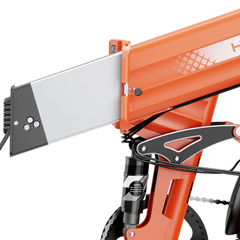 Close-up of the removable battery partially inserted into the orange Mars 3.0 frame.