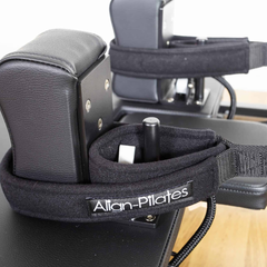 Align-Pilates R8-Pro Light Commercial Reformer Black close-up showing foot strap and carriage details