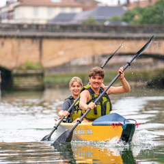 Aqua Marina Tomahawk AIR-K 14'5" Kayak on water with two people paddling