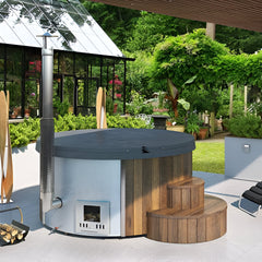 Outdoor hot tub with wooden steps and a modern design in a garden setting.