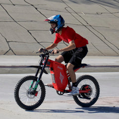 FreeGo X2 Pro All-Terrain Dirt eBike red rider action view